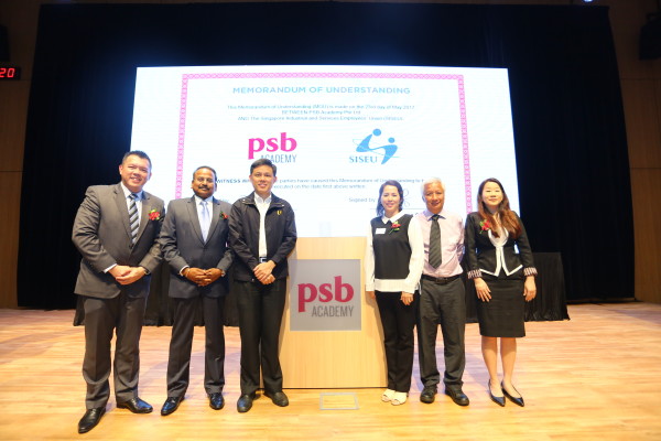 From left to right: Derrick Chang, CEO of PSB Academy; Viva Sinniah, executive chairman of PSB Academy; Chan Chun Sing; Joanne Chua, president of SISEU; Philip Lee, general secretary of SISEU; and Sylvia Choo, executive secretary of SISEU
